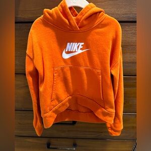 Orange Nike sweatshirt